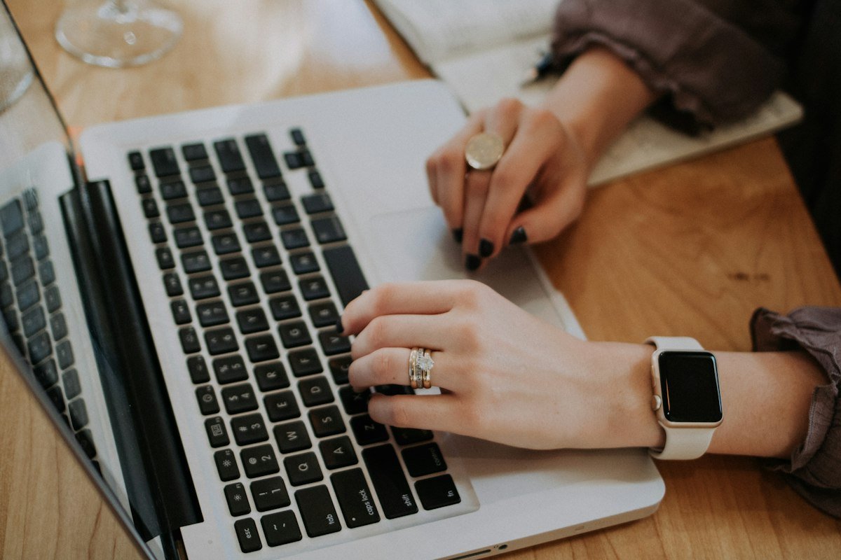 Freelancer creating an Upwork account and profile on a laptop