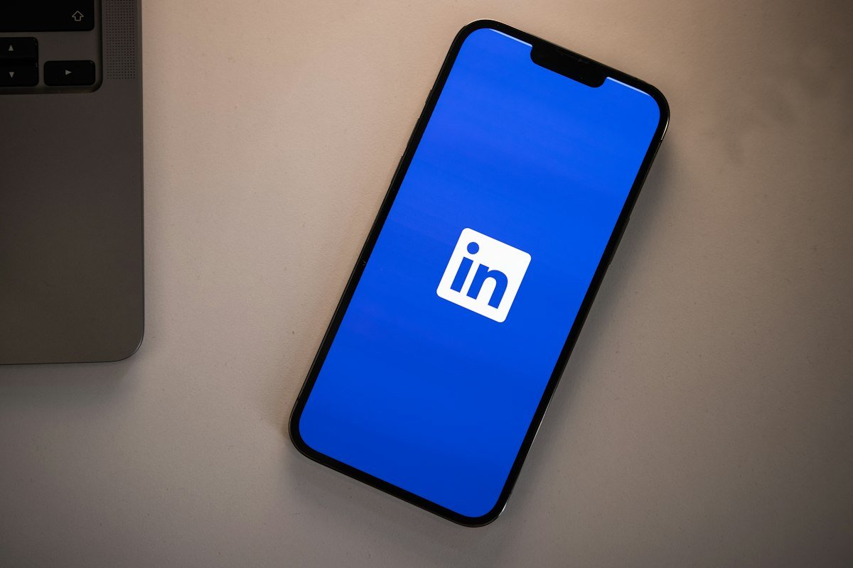 LinkedIn app on a phone, a key platform for LinkedIn marketing freelancers