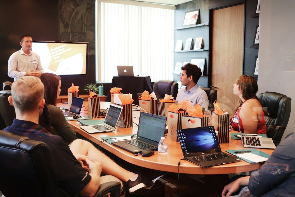 Sales team meeting to plan outreach using generated leads